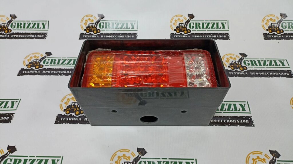 Фонарь задний в корпусе большой левый от компании GRIZZLY PARTS - фото 1