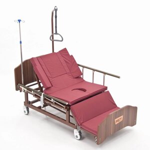 Функциональная электрическая кровать для лежачих больных с USB, переворотом и туалетом MET REVEL