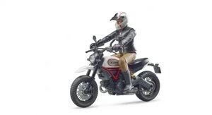 Мотоцикл Scrambler Ducati Desert Sled с мотоциклистом