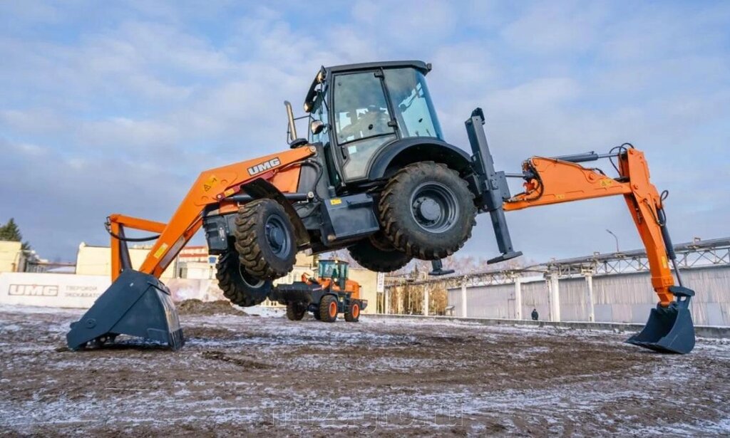Экскаватор-погрузчик UMG TLB 1509 от компании ООО "МТЗ-АГРО" - фото 1