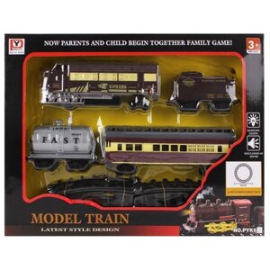 Игрушка Железная дорога - железнодорожный поезд / игровой набор локомотив с вагонами свет / звук / на батарейках