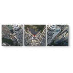 Модульная картина Над верхушками башен Петронас, Куала-Лумпур120x40