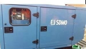 Дизельный генератор SDMO T33 в кожухе б/у от компании СТРОИТЕЛЬНОЕ ОБОРУДОВАНИЕ - фото 1