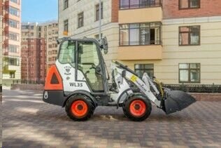 Мини-погрузчик POLAR BADGER WL35 от компании СТРОИТЕЛЬНОЕ ОБОРУДОВАНИЕ - фото 1