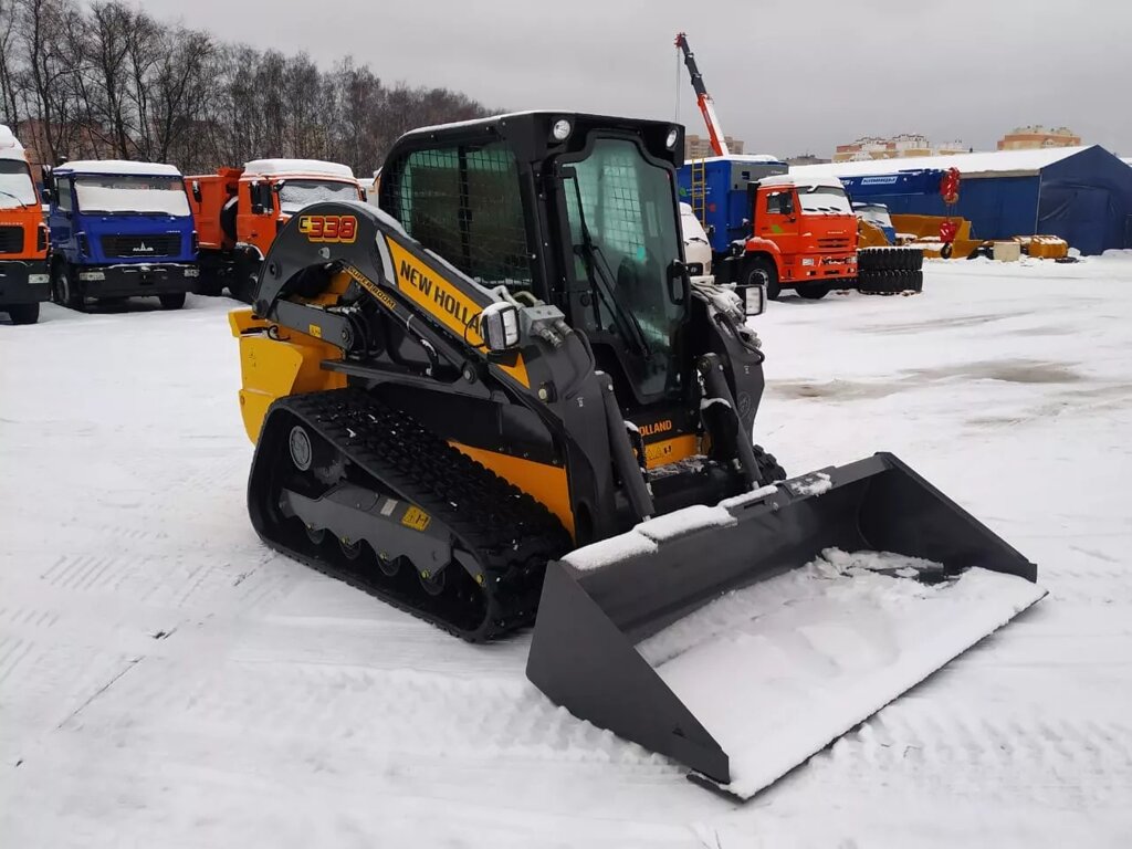 Мини-погрузчик гусеничный New Holland C338 от компании Компания СИМ-авто - фото 1