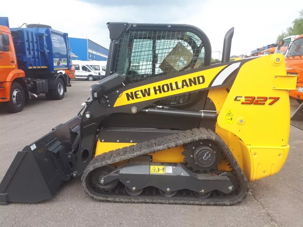 Мини-погрузчик гусеничный  New Holland С327 от компании Компания СИМ-авто - фото 1