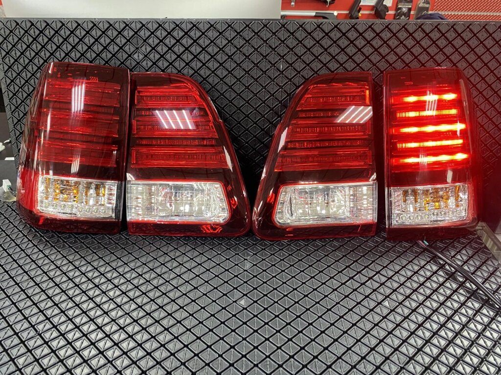 Фонари задние светодиодные красные + хрустальные в стиле Lexus LX470 для Land Cruiser 100 от компании Тюнинг и аксессуары для автомобилей "ALEX-M" - фото 1