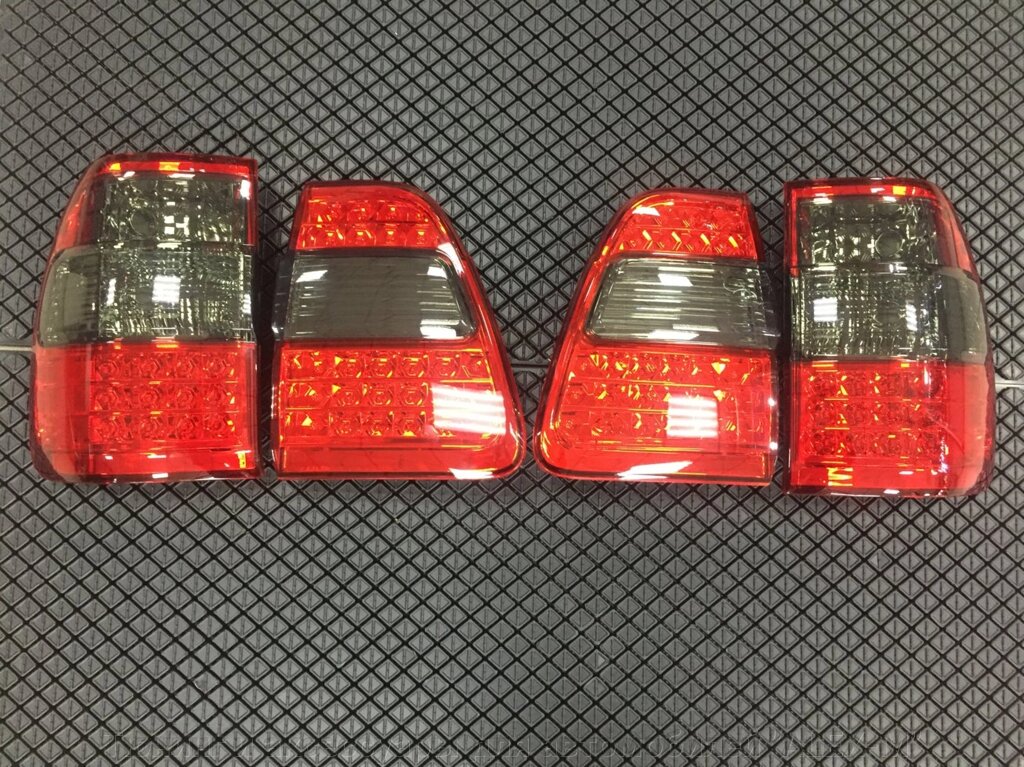Фонари задние светодиодные красные + тонированные в стиле 2006г для Toyota Land Cruiser 100 (комплект) от компании Тюнинг и аксессуары для автомобилей "ALEX-M" - фото 1