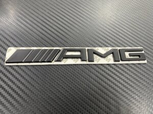 Надпись на крышку багажника AMG чёрная матовая старого образца образца из нержавеющей стали 18,5 см для Mercedes Benz