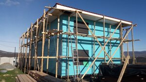 Монтаж имитации бруса на фасады дома в Крыму от компании Дом Дока