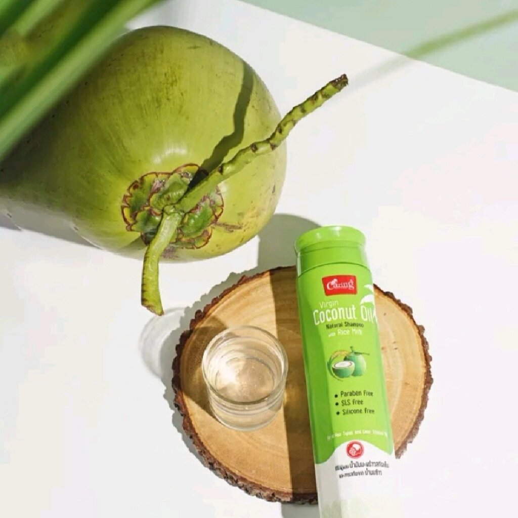 Шампунь для волос с кокосовым маслом Caring Virgin Coconut Oil Natural Shampoo With Rice Milk, 200 мл. Таиланд от компании Тайская косметика и товары из Таиланда - Melissa - фото 1