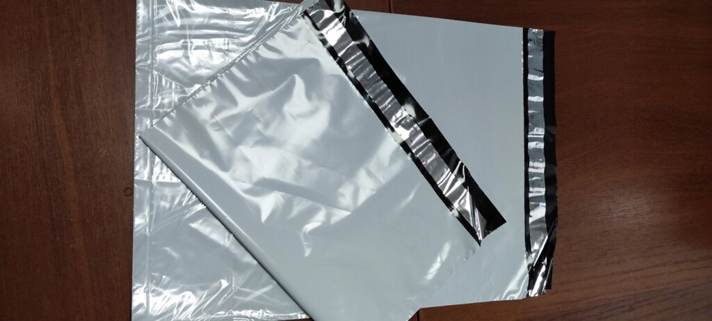 Курьерский пакет 300 х 400 х 50мкм с карманом от компании ООО"ТК"УльтраПак" - фото 1
