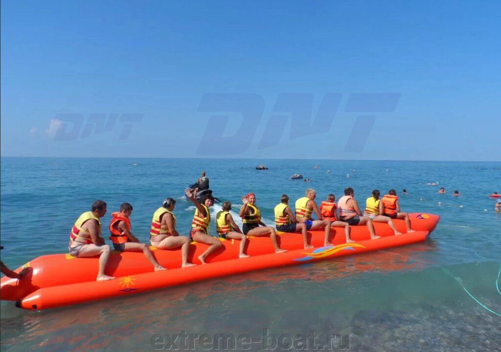 Водный аттракцион Банан 14 мест от компании DNT Производство надувных аттракционов и лодок - фото 1