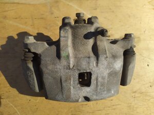 Суппорт передний левый MR955065 (2) Mitsubishi Lancer 9 Митсубиси Лансер 9