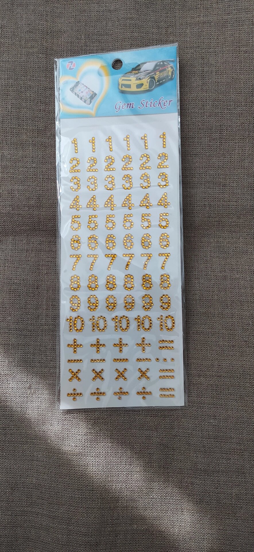 Стразы самоклеющиеся на листе 9/20см  (желтые цифры) от компании Магазин ШвейМаг - фото 1