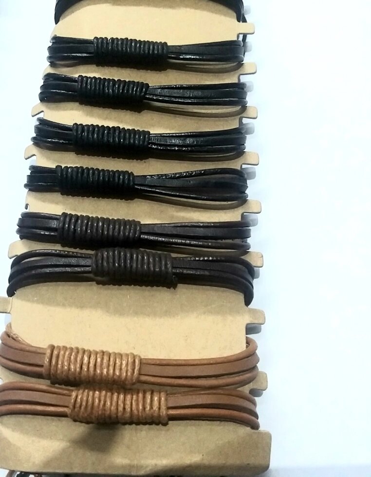 Кожаные черно-коричневые браслеты плетеные от компании R.R.R. Бижутерия и украшения оптом - фото 1