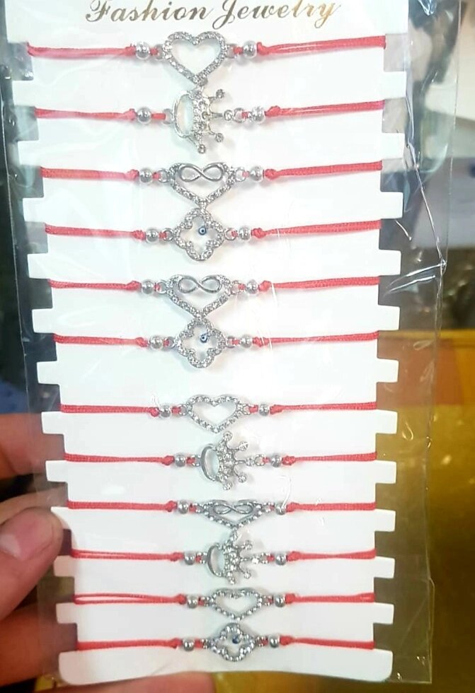 Красная ниточка браслеты унисекс от компании R.R.R. Бижутерия и украшения оптом - фото 1