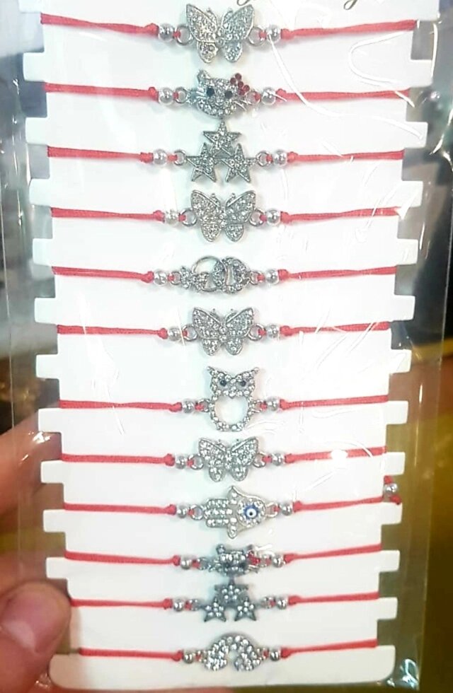 Модные браслеты - Красная нить на запястье от компании R.R.R. Бижутерия и украшения оптом - фото 1