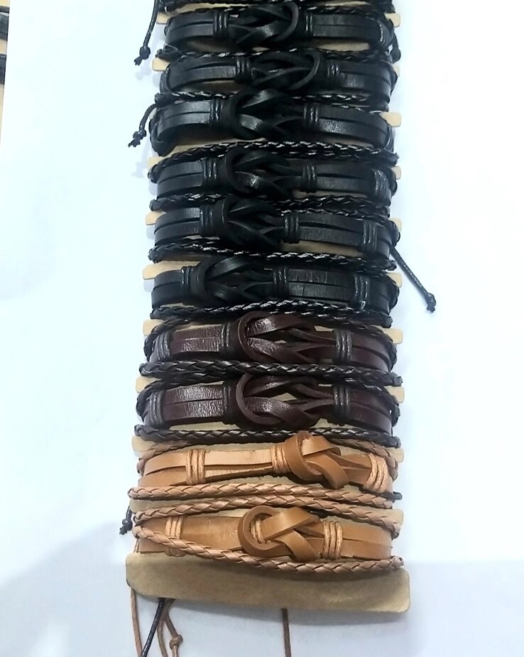 Плетеные модные кожаные браслеты ручной работы от компании R.R.R. Бижутерия и украшения оптом - фото 1