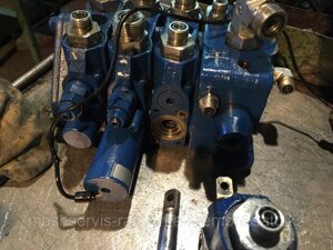 Секции гидравлические ремонт гидрораспределителя экскаваторов погрузчиков Volvo 61 и 71