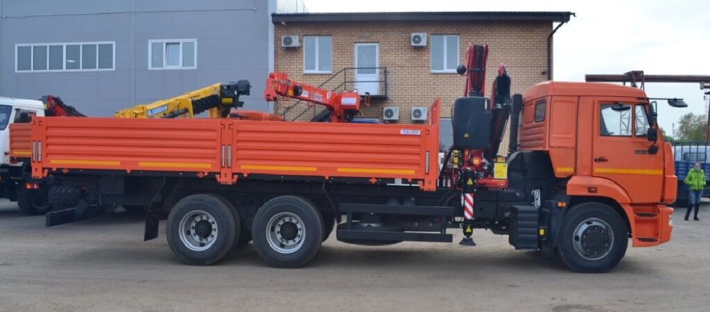 Бортовой Камаз-65115-42 с КМУ Fassi F245A.0.22 (нижнее управление) от компании ООО Дайзен - фото 1