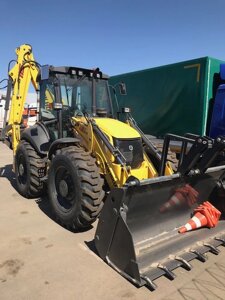 Экскаватор погрузчик New Holland B 115 Италия Нью Холланд