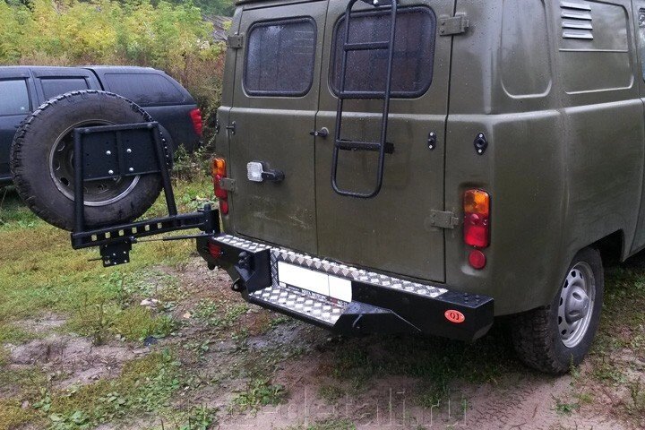 Бампер задний силовой OJ с левой калиткой от компании УАЗ Детали - магазин запчастей и тюнинга на УАЗ - фото 1