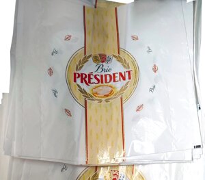 Упаковочный материал двухслойный для упаковки сыра Камамбер в листах и рулонах