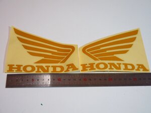 Наклейки на бак Honda жёлтые крылья