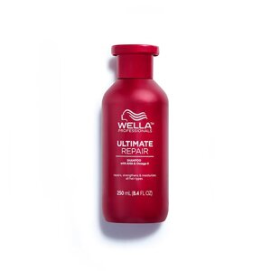 Wella 250 мл. Ultimate Repair Shampoo - восстанавливающий шампунь.