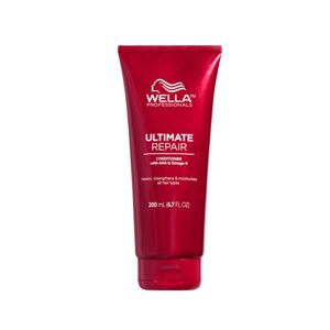 Wella 200 мл. Ultimate Repair conditioner -глубоко питательный кондиционер для поврежденных волос.