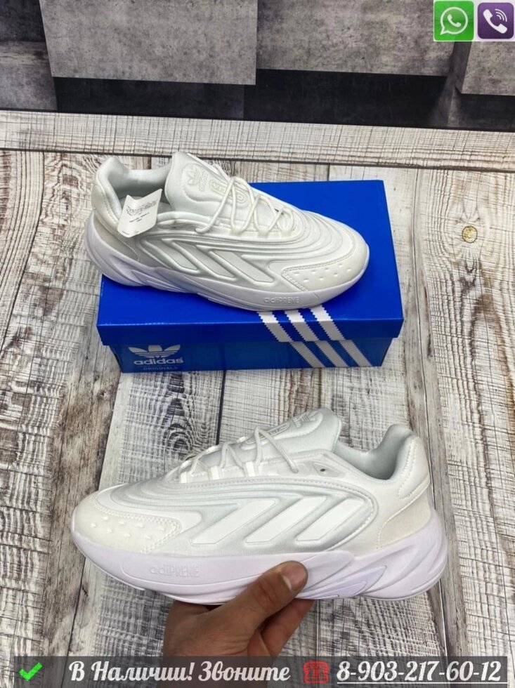 Кроссовки Adidas Ozelia белые от компании Интернет Магазин брендовых сумок и обуви - фото 1