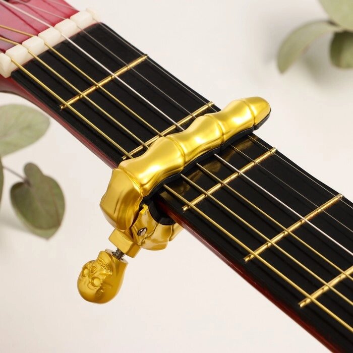 Каподастр для гитары Music Life Череп, золотой от компании Интернет - магазин Flap - фото 1