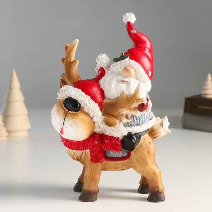Сувенир полистоун "Дед Мороз верхом на олешке в красном колпаке и шарфике" 8х14х23 см от компании Интернет - магазин Flap - фото 1