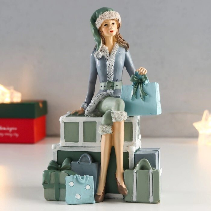 Сувенир полистоун "Девушка в костюме санты на горе подарков" 18х7,5х11 см от компании Интернет - магазин Flap - фото 1