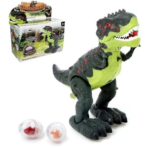 Динозавр «Рекс», откладывает яйца, проектор, свет и звук, работает от батареек, цвет зелёный от компании М.Видео - фото 1