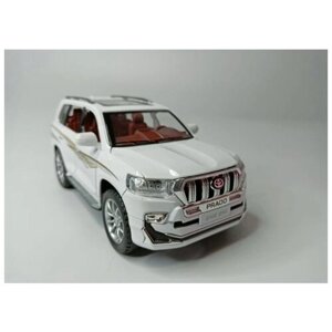 Коллекционная машинка игрушка металлическая Toyota Land Cruiser Prado для мальчиков масштабная модель 1:24 белый