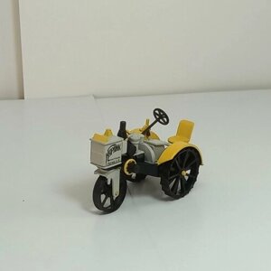 Коллекционная модель трактора Hachette "Карлик", желтый/серый/черный, 1:43
