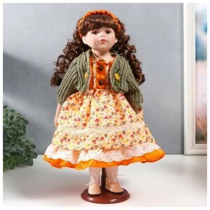 Кукла коллекционная керамика Вера в платье с мелкими цветами и зелeном джемпере 40 см