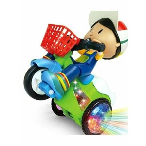 Мальчик на велосипеде Stunt Tricycle