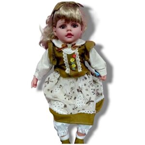 Кукла музыкальная в платье 60 см в Москве от компании М.Видео