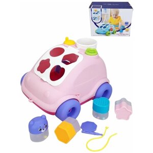 Сортер для малышей Машинка розовая развивающая игрушка от 1 года каталка с веревочкой в Москве от компании М.Видео