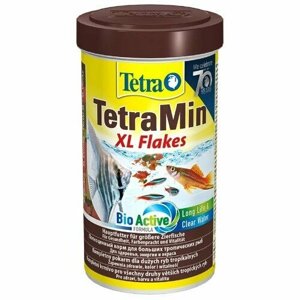 Основной корм для всех видов тропических рыб Tetra в крупных хлопьях 500 мл