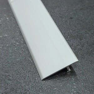Профиль Т-образный ассиметричный алюминиевый (порожек) для плитки 33мм 2,7м Серебро матовое