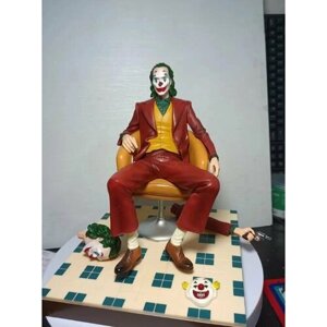 Красный клоун, сидячая поза клоуна-самоубийцы Хита Леджера