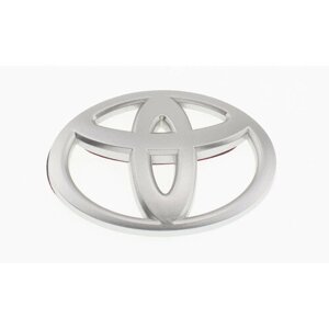 Эмблема универсальная вогнутая Toyota серебристая 52x35 мм