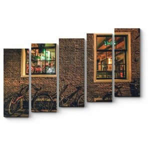 Модульная картина Велосипеды у кирпичной стены амстердамского паба 100x70