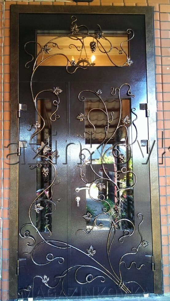 Дверь кованая «Стефания Х» металлическая с ковкой и стеклопакетом от компании MAGAZINKOVKA - фото 1