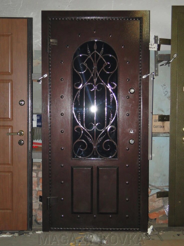 Дверь кованая «Жаклин Х» металлическая с ковкой и стеклопакетом от компании MAGAZINKOVKA - фото 1