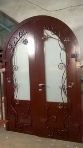 Дверь кованая "Венеция X" металлическая арочная с ковкой и стеклопакетом в Москве от компании MAGAZINKOVKA